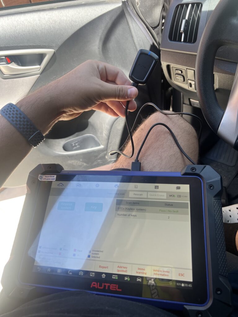 NELA Locksmith programming a Toyota car key in Los Angeles
